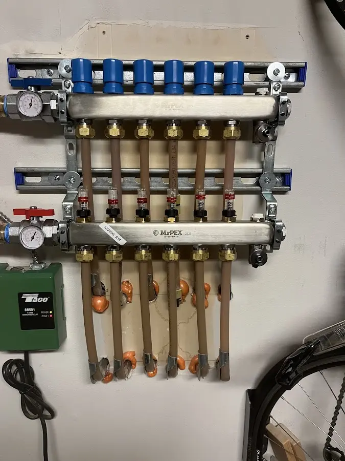 Plumber performing Water Heater Repair at a residential property in Socorro